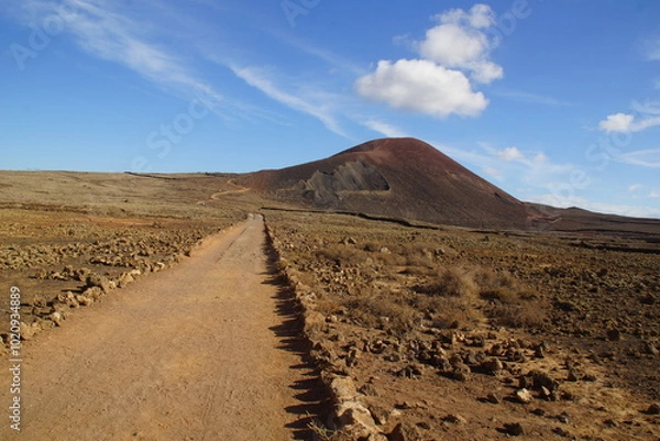 Fototapeta desertic landscape of volcano and caldera on the sea side