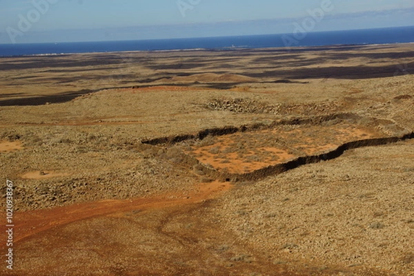 Fototapeta desertic landscape of volcano and caldera on the sea side