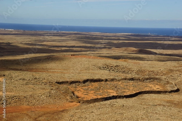 Fototapeta desertic landscape of volcano and caldera on the sea side