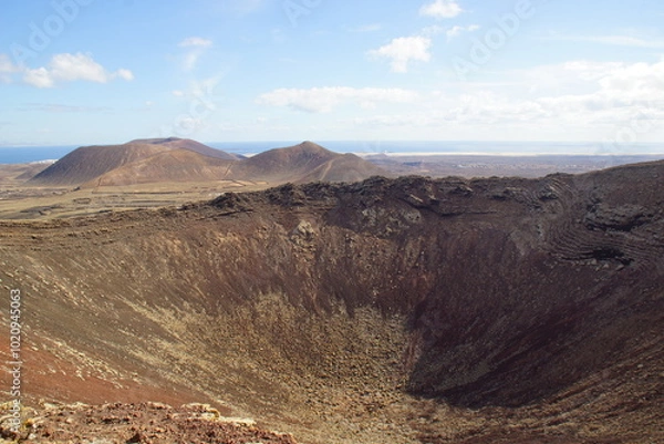 Fototapeta desertic landscape of volcano and caldera on the sea side
