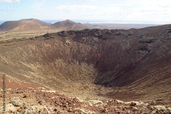Fototapeta desertic landscape of volcano and caldera on the sea side