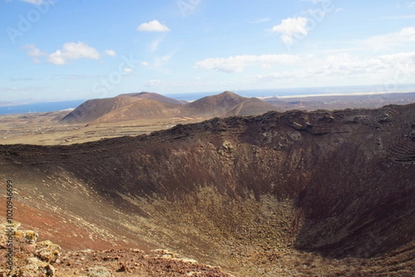 Fototapeta desertic landscape of volcano and caldera on the sea side