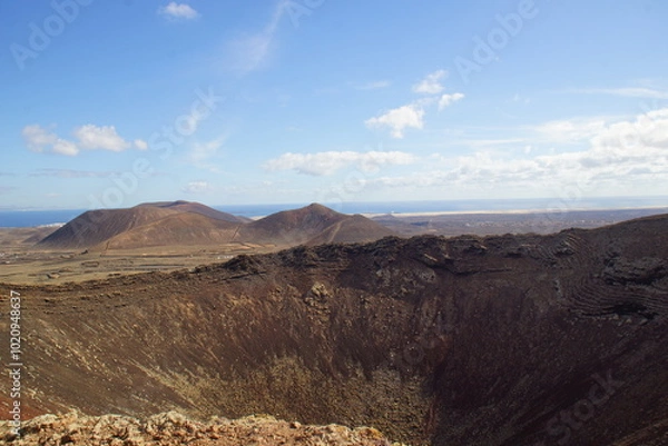 Fototapeta desertic landscape of volcano and caldera on the sea side