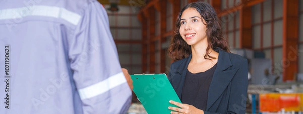 Fototapeta Close up Female manager or professional entrepreneur is interview or discussion with engineer in industry or factory, concept on side occupation or job interview, human resources find colleague.