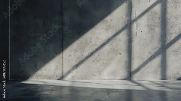 Obraz Sunlight casting shadows on a minimalist concrete wall.