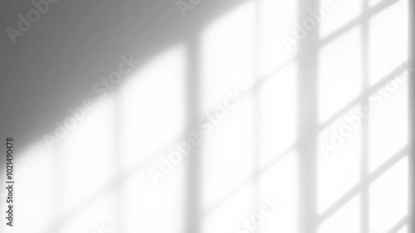 Fototapeta Light from a window on a white wall.