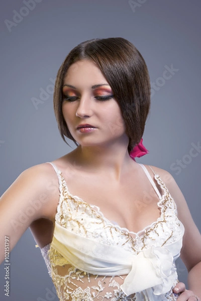 Fototapeta Wedding Dress Concept. Sexy Looking Caucasian Female Posing in Wedding Dress