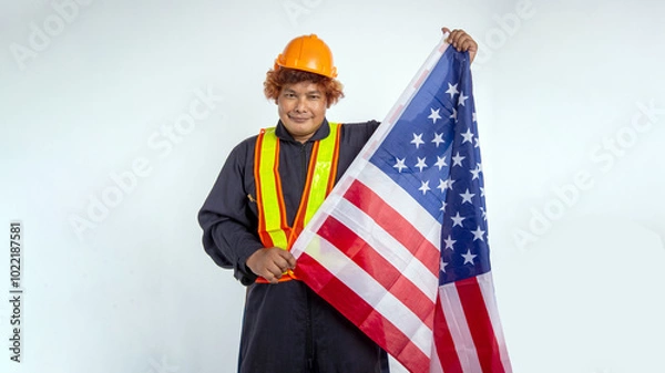Fototapeta Workers, labor, wearing safety gear hold the American flag.
