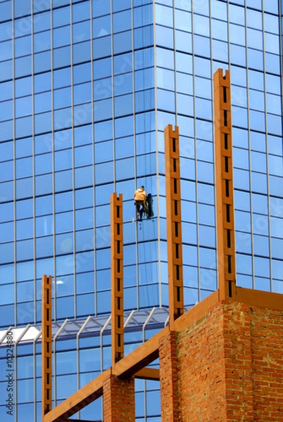 Fototapeta Skyscrapper  - window cleaner