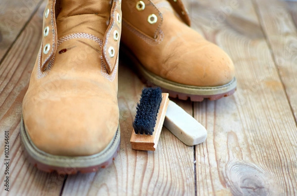 Obraz old yellow leather boots cleaning kit