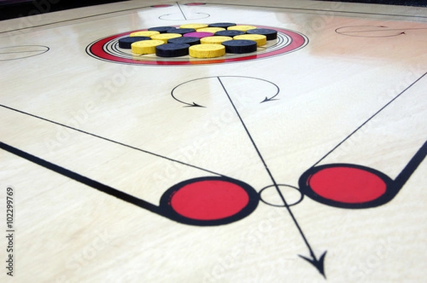 Fototapeta Carrom board with striker and coins