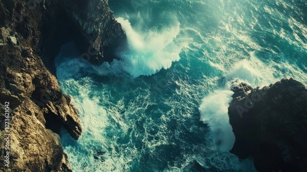 Fototapeta Ocean Waves Crashing Against Rugged Cliffs