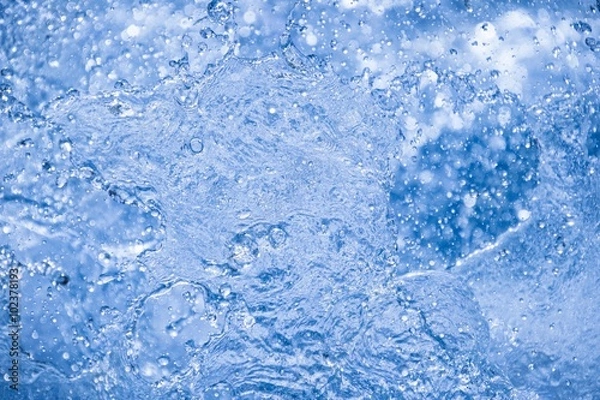 Fototapeta Splashing water and droplets in the pool