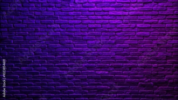 Fototapeta A close-up of a neon purple brick wall illuminated by light, showcasing its textured pattern for an industrial design aesthetic.