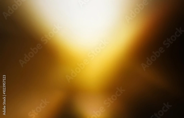 Fototapeta A blurry image of yellow and brown hues with a bright white center, resembling a hazy sun.