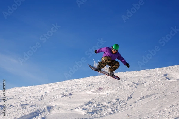 Obraz Snowboarder jumping