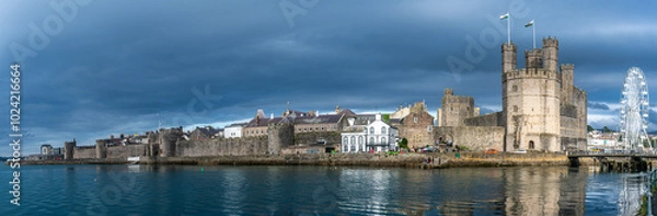 Obraz Caernarfon Castle, Gwynedd, Wales, UK - Caernarfon Castle in North West Wales on then banks of Afon Seiont. Built in 1330 it is now a Unesco World Heritage site.