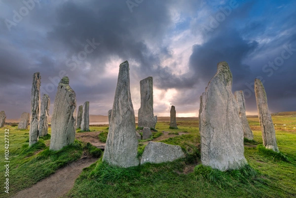 Obraz The ancient standing stones of Callanish (or Calanais) on Lewis in the Outer Hebrides of Scotland at sunset