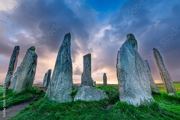 Obraz The ancient standing stones of Callanish (or Calanais) on Lewis in the Outer Hebrides of Scotland at sunset
