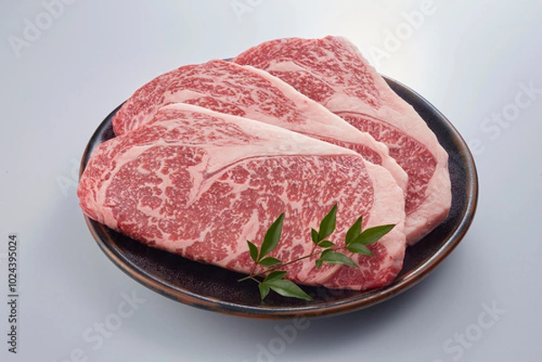 Obraz ステーキ用にカットされた生の霜降りリブロース