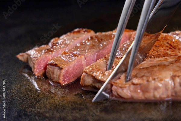 Obraz ホテルのレストラン風のステーキカットサービス。