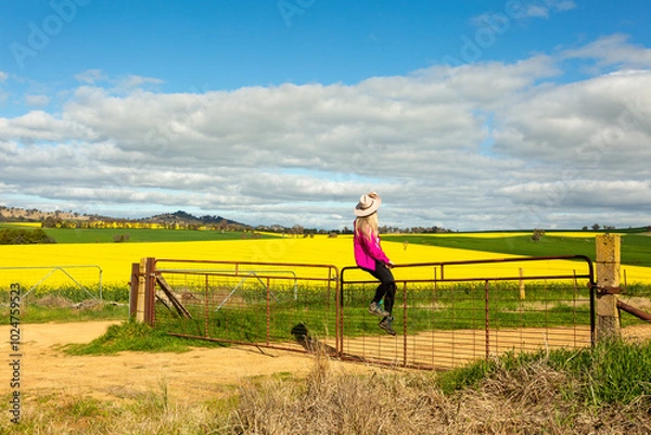 Obraz Woman looks out over her farming fields