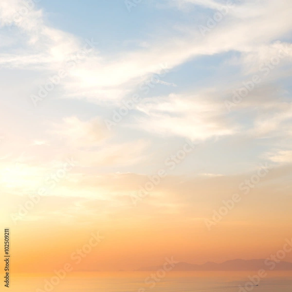 Fototapeta sunset sun   in the sky of world cloudy fluffy cloudscape