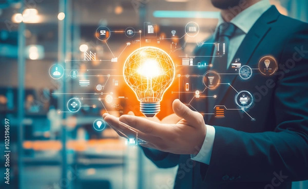 Fototapeta Hand holding a glowing lightbulb surrounded by interconnected lines, symbolizing innovation and creativity.