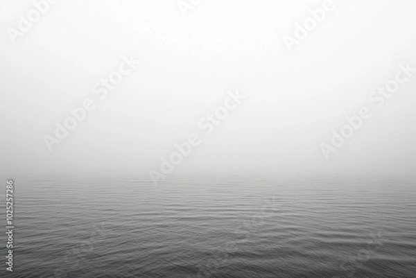 Fototapeta Calm Water Surface With Foggy Sky