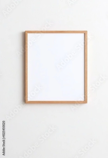 Fototapeta Wooden Frame Mockup on White Wall in Minimalist Interior Displaying Empty Space for Text or Product. Made with Generative AI Technology