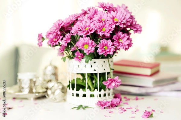 Obraz Beautiful flowers in vase on table in room