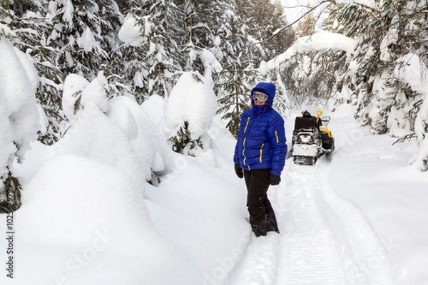 Obraz Woman in the winter forest.