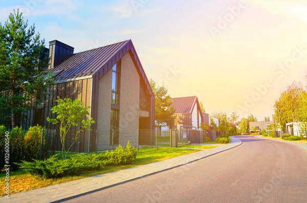 Fototapeta Barn House in village. Luxury house in suburb. Wooden Scandi home. Modern Scandinavian Barnhouse. Contemporary barnhouse in green environment. Modern Barn house in Gated Community. Low-energy house.