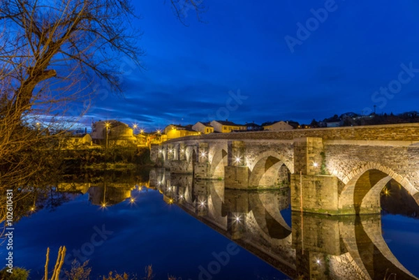 Fototapeta The Roman Bridge in Lugo during blue hour at the Camino Primitivo, a World Heritage