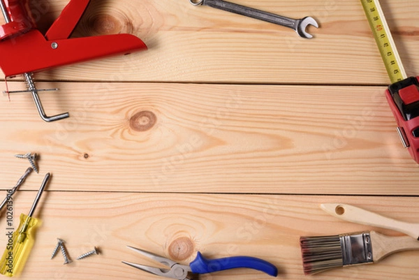 Obraz Carpentry, construction hardware tools on wooden planks. Top view, copy space.