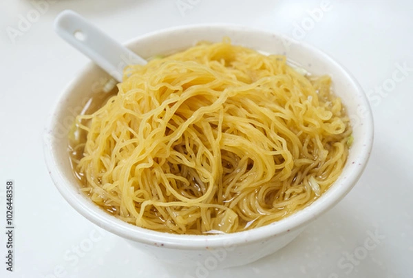 Fototapeta Authentic Hong Kong style wonton noodle soup with the wonton (dumpling) invisible and of small portion 