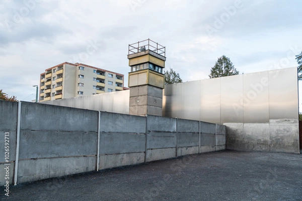 Obraz Section of the original Berlin Wall with a watchtower, in Berlin, Germany.