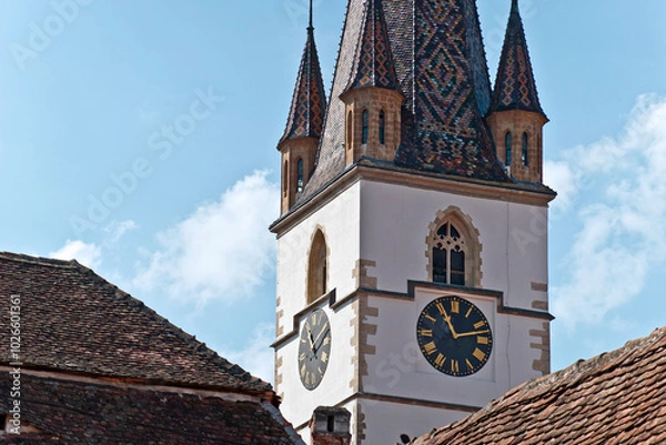 Fototapeta Fragment from the clock tower of Lutheran Cathedral of Saint Mary. It is a prominent landmark in Sibiu, Romania, one of the largest Gothic-style churches in Transylvania.
