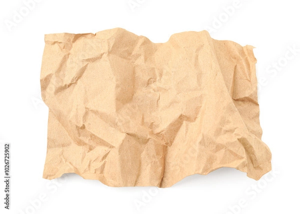 Fototapeta Crumpled kraft paper sheet isolated on white, top view