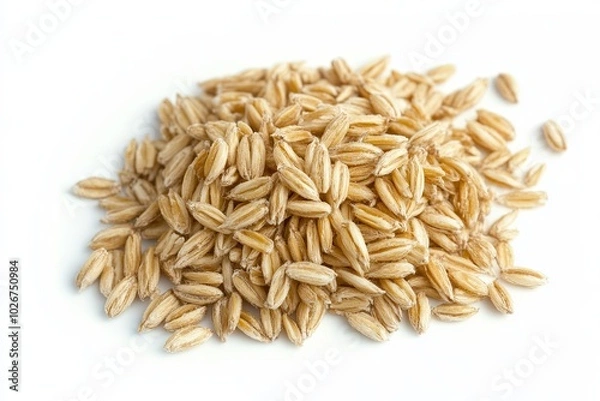 Fototapeta Barley Grains Scattered on a White Background Showcasing Their Natural Texture and Color