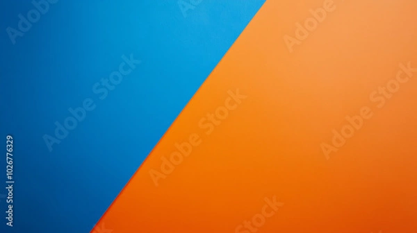 Fototapeta diagonal blue and orange background with crisp delineation