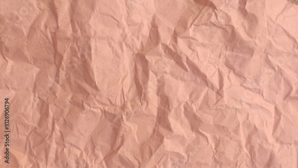 Fototapeta Brown recycled craft paper texture as background. Brown paper texture, Old vintage page or grunge vignette of old newspaper. Pattern rough art creased