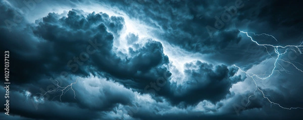 Fototapeta Dramatic thunderstorm with bright lightning against dark clouds and sunlight