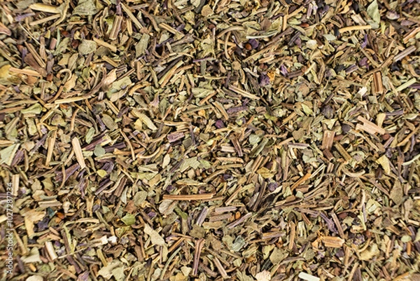 Fototapeta Dry basil spice seasoning macro texture top view