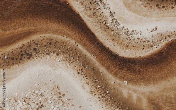 Fototapeta Desert sand patterns. Aerial view of desert sand with natural patterns and textures. The image conveys a sense of tranquility and vastness.
