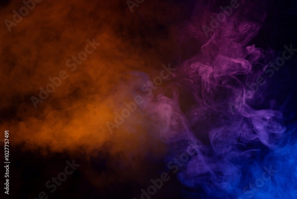 Obraz Blue and pink steam on a black background.