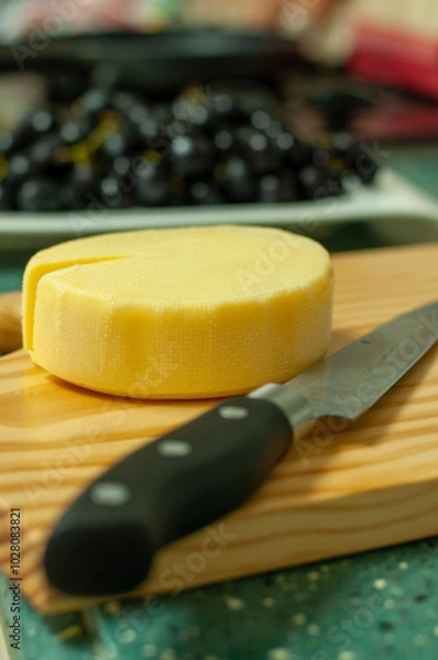 Obraz A piece of cheese in the kitchen