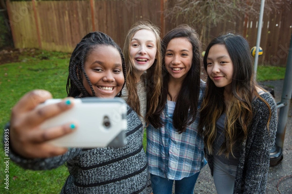 Obraz Group of kids taking a selfie