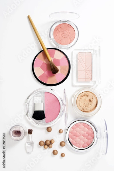 Obraz cosmetics on white with light shadows