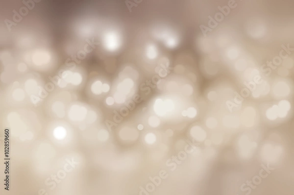 Fototapeta Bokeh light, shimmering blur spot lights on beige abstract 